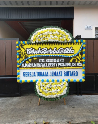Papan Bunga Duka di Ungar